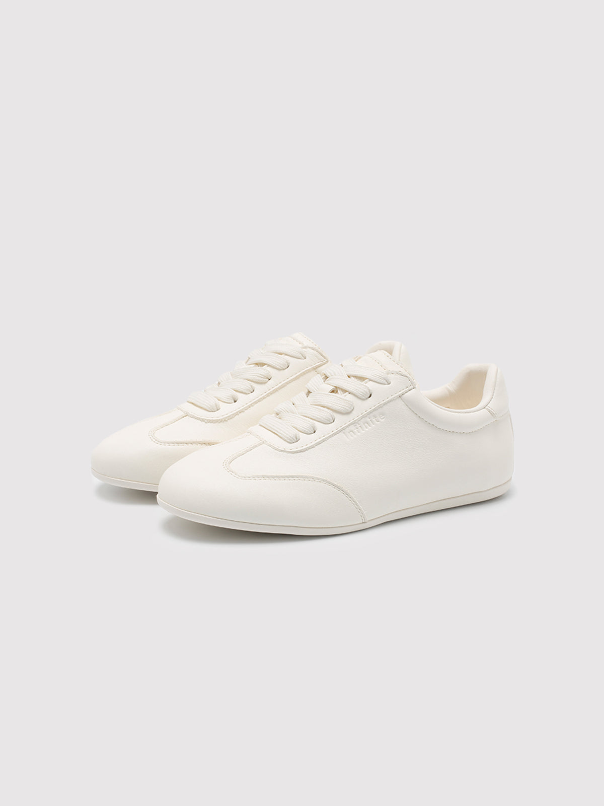 Women's minimalist white leather sneakers by MafeMato